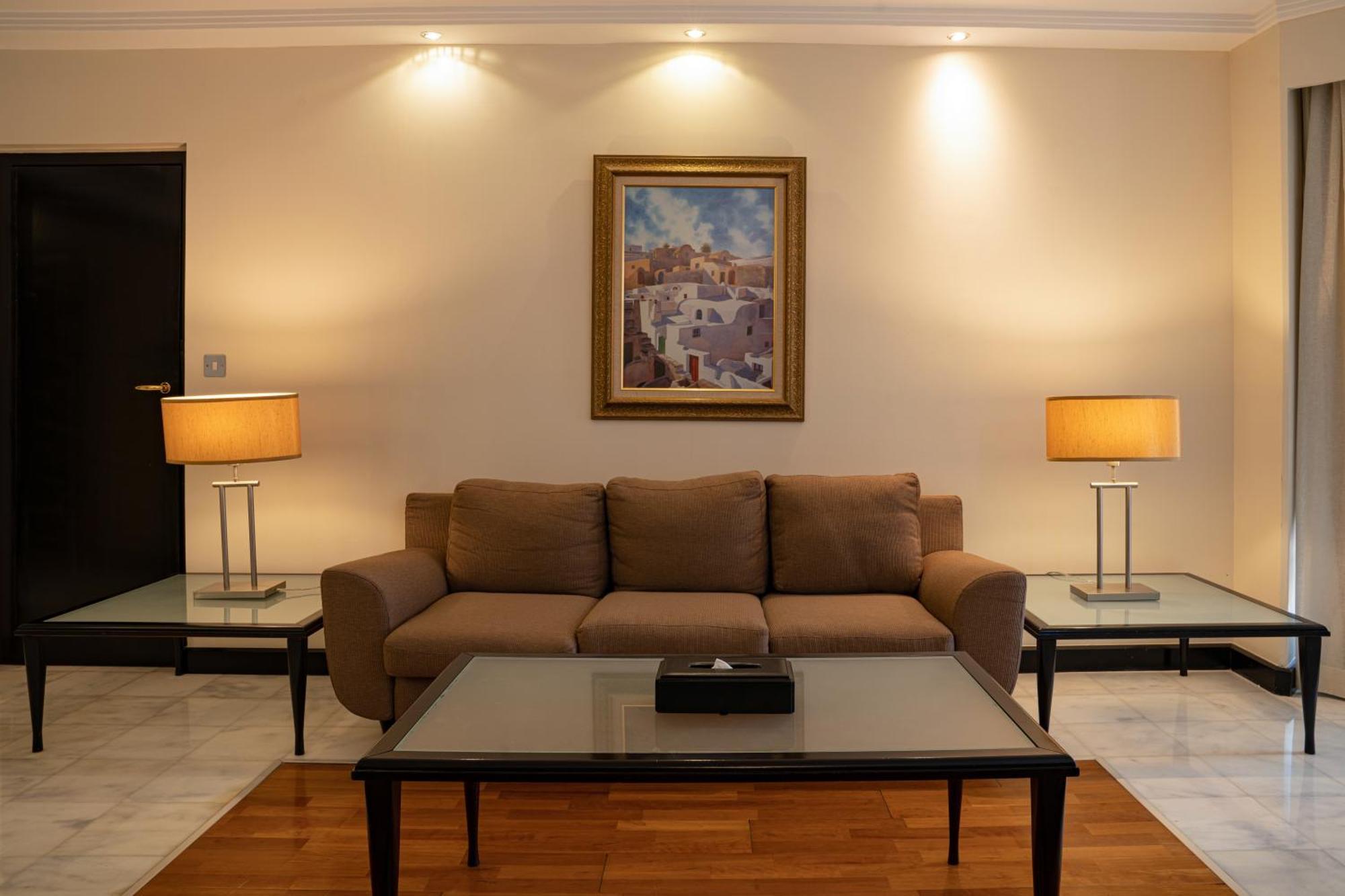 Danat Al Ain Resort Екстериор снимка A living room with a sofa